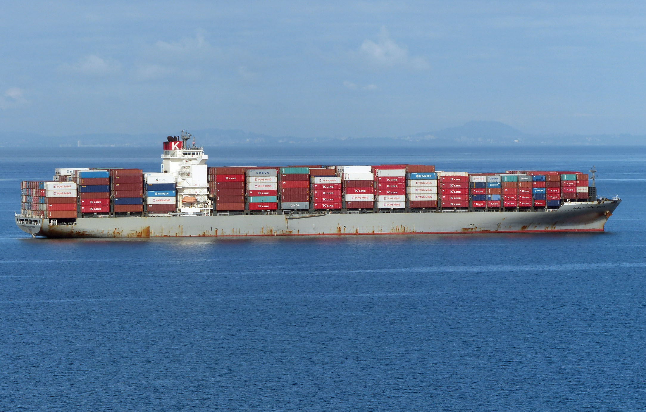 The container ship Bear Mountain Bridge anchored off Lees Creek in eastern Port Angeles Harbor. (David G. Sellars/for Peninsula Daily News)