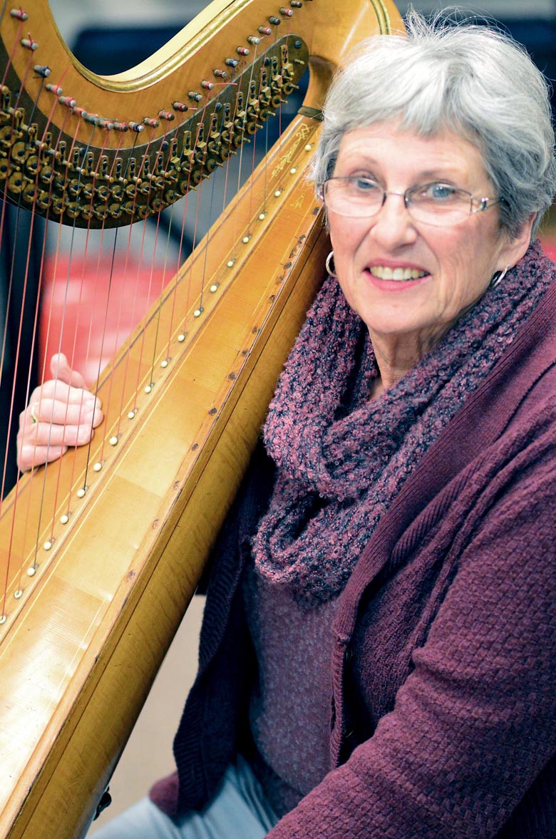 Janeen Kelm and her century-old harp will be part of tonight's Sequim Community Orchestra concert. ()