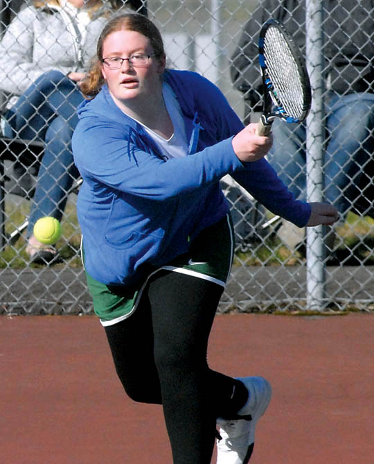 Port Angeles' Audrey Little hits the return in her singles match against Coupeville's Valen Trujillo on Thursday at Port Angeles High School. (Keith Thorpe/Peninsula Daily News)