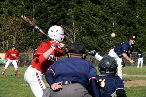 Forks' Reece Blattner delivers a pitch to catcher Gavin Palmer during the Spartans' 14-3 loss at home to Tenino on Friday. (Lonnie Archibald/for Peninsula Daily News)