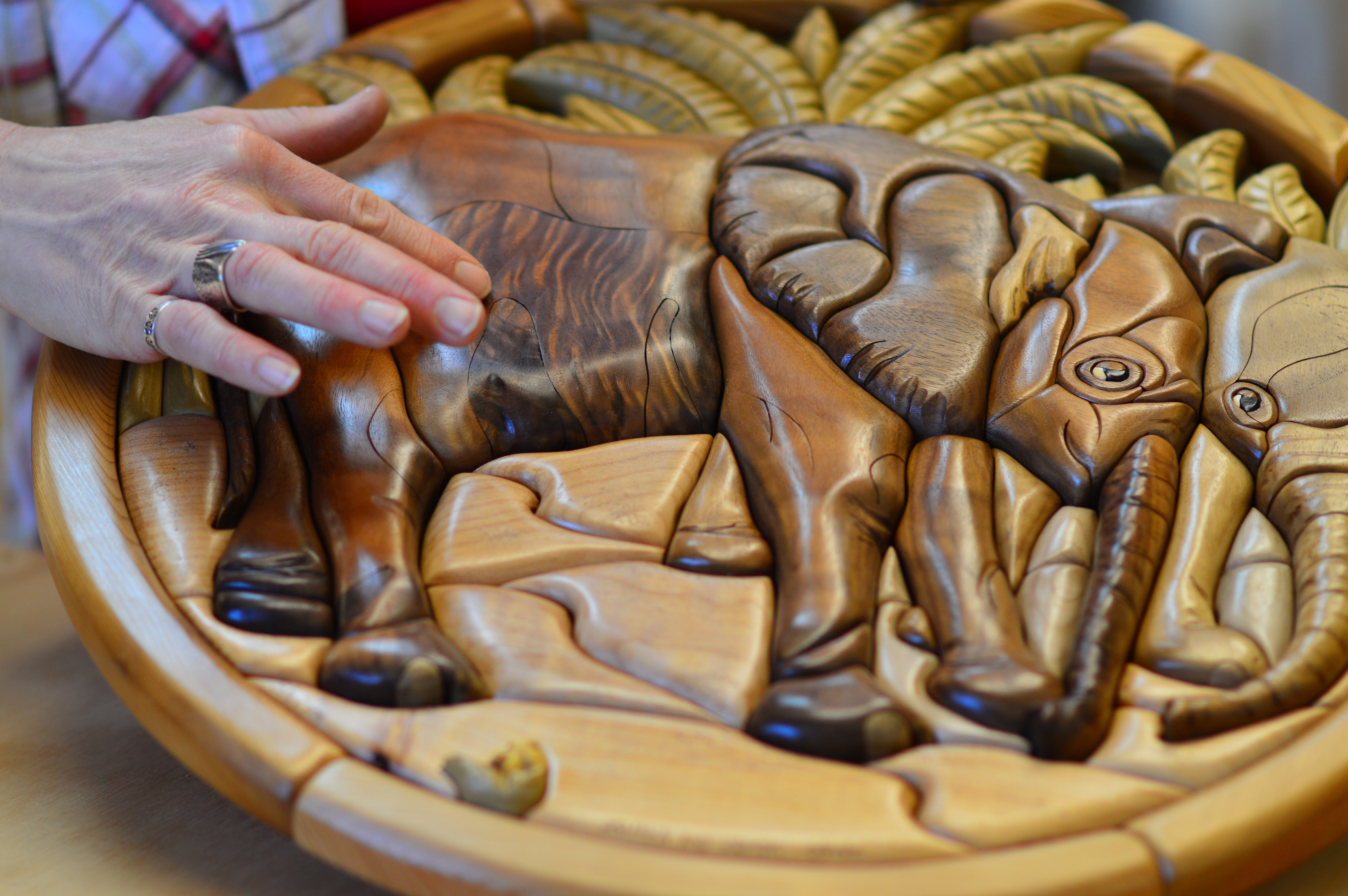 Sequim artist Sherri Lewis' wood mural of two young elephants netted $6