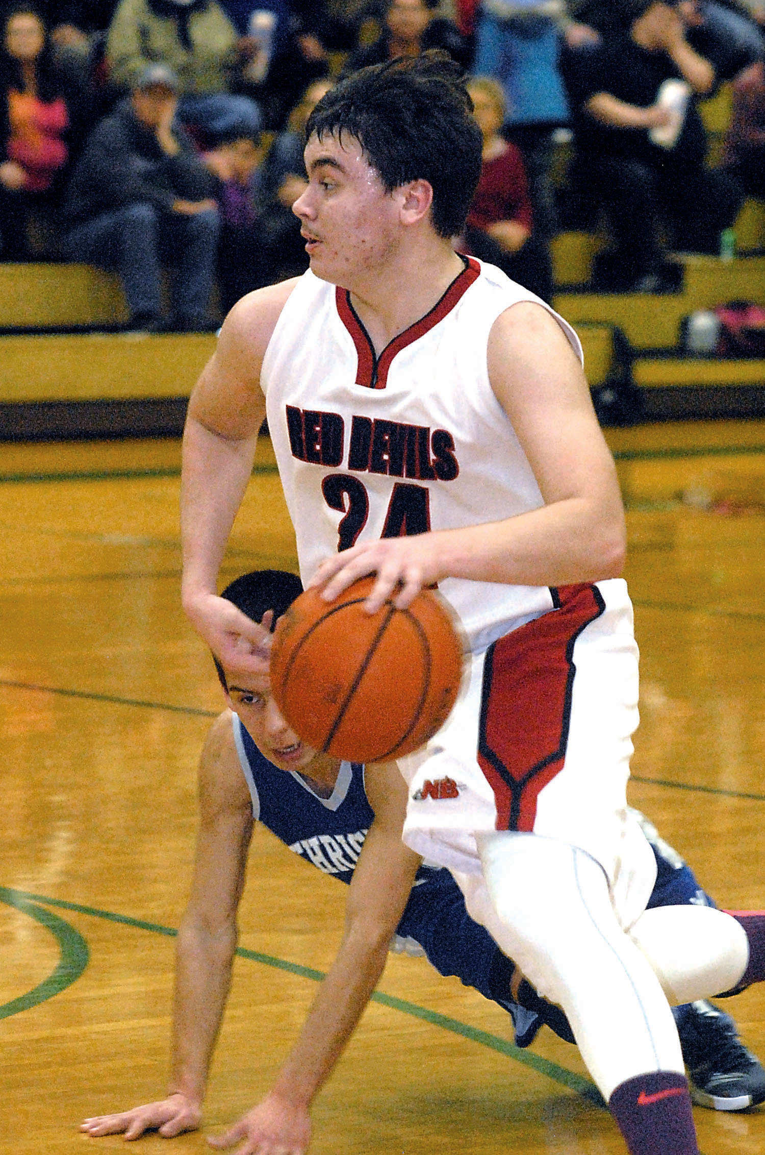 Neah Bay's Ryan Moss drives toward the hoop against Mount Vernon Christian during the Tri-District tournament at Port Angeles High School. (Keith Thorpe/Peninsula Daily News)