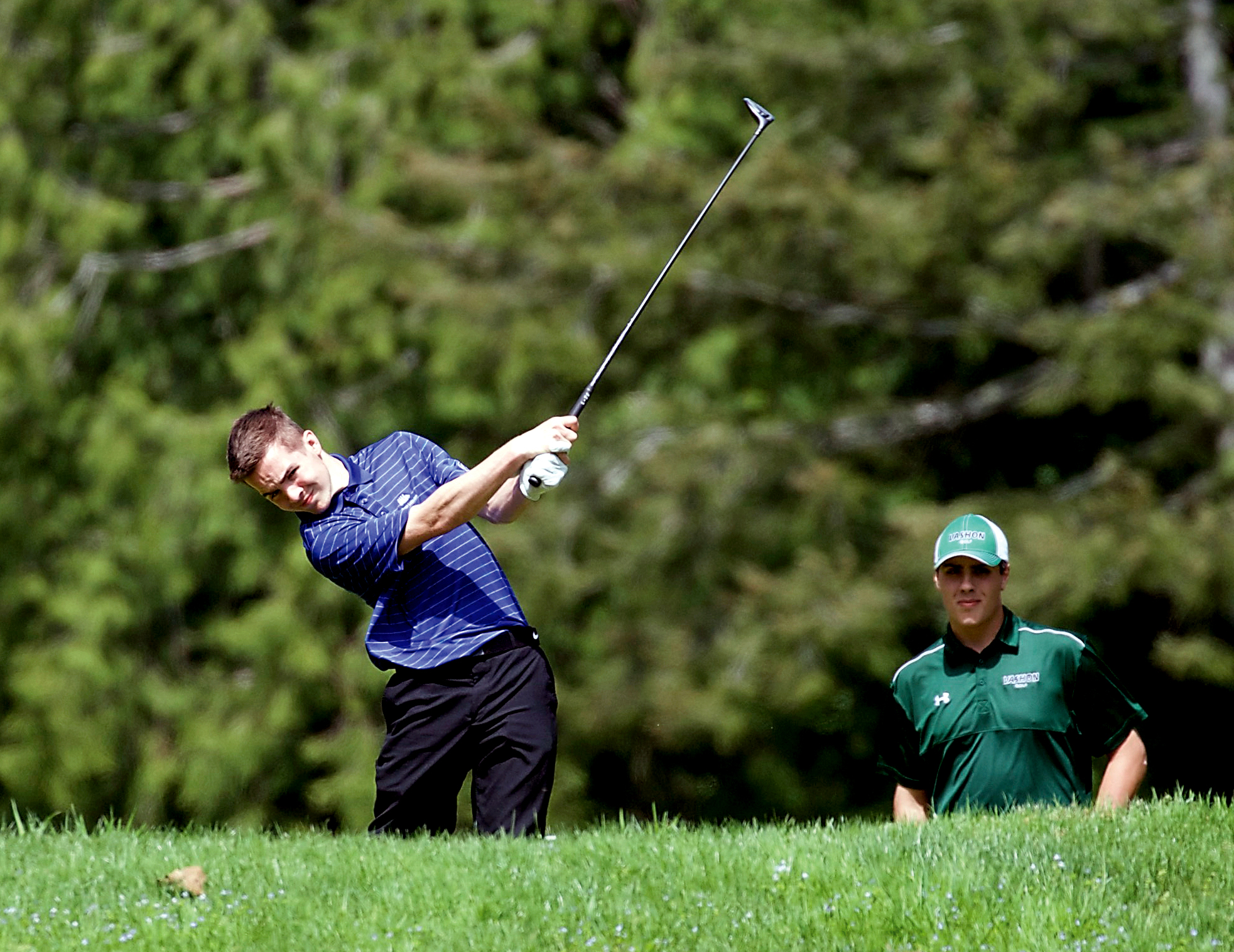 Chimacum's Chris Bainbridge hits a tee shot during the Port Ludlow Invitational at Port Ludlow Golf Course. Bainbridge finished tied for seventh. (Steve Mullensky/for Peninsula Daily News)