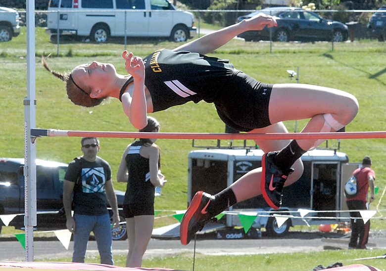 Clallam Bay's Molly McCoy clears the bar in the girls high jump at the North Olympic League championship meet at Port Angeles High School. (Keith Thorpe/Peninsula Daily News)