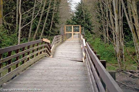 A trestle that carries the Olympic Discovery Trail — and the North Olympic Discovery Marathon — over the Dungeness River remains closed after flood damage last winter. (Chris McDaniel/Peninsula Daily News)