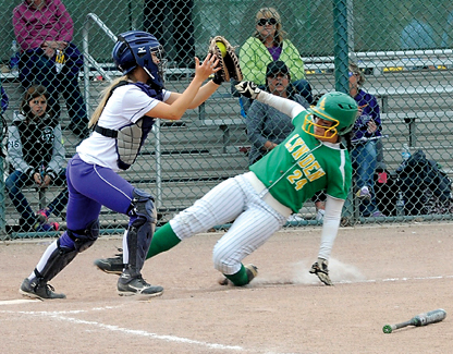 Sequim catcher Emily Copeland makes a force out of Lynden's Taylor Eshuis at home plate during the Class 2A state tournament in Selah. (Lonnie Archibald/for Peninsula Daily News)