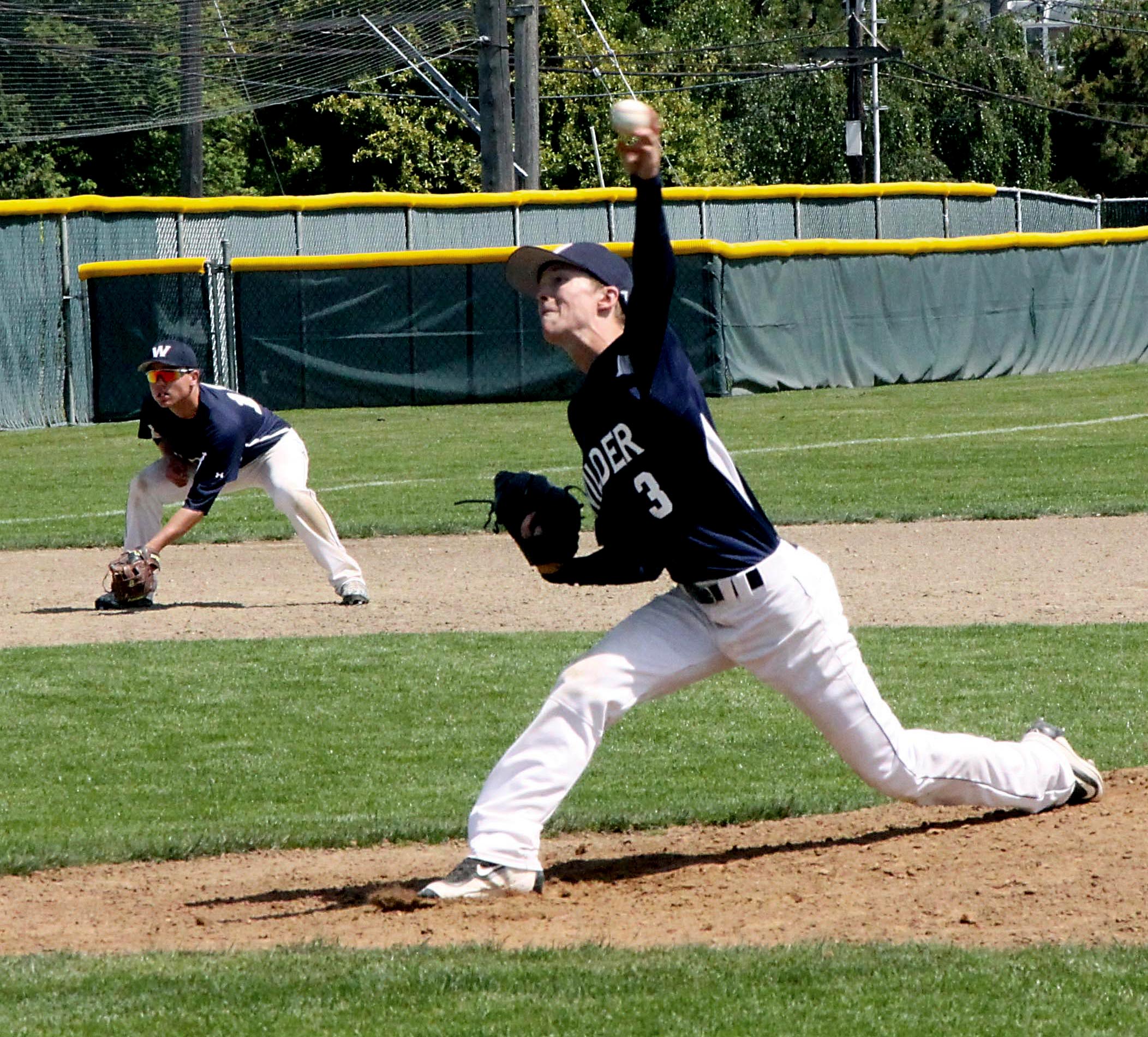 Wilder's Curan Bradley fires a pitch while third baseman Matt Hendry