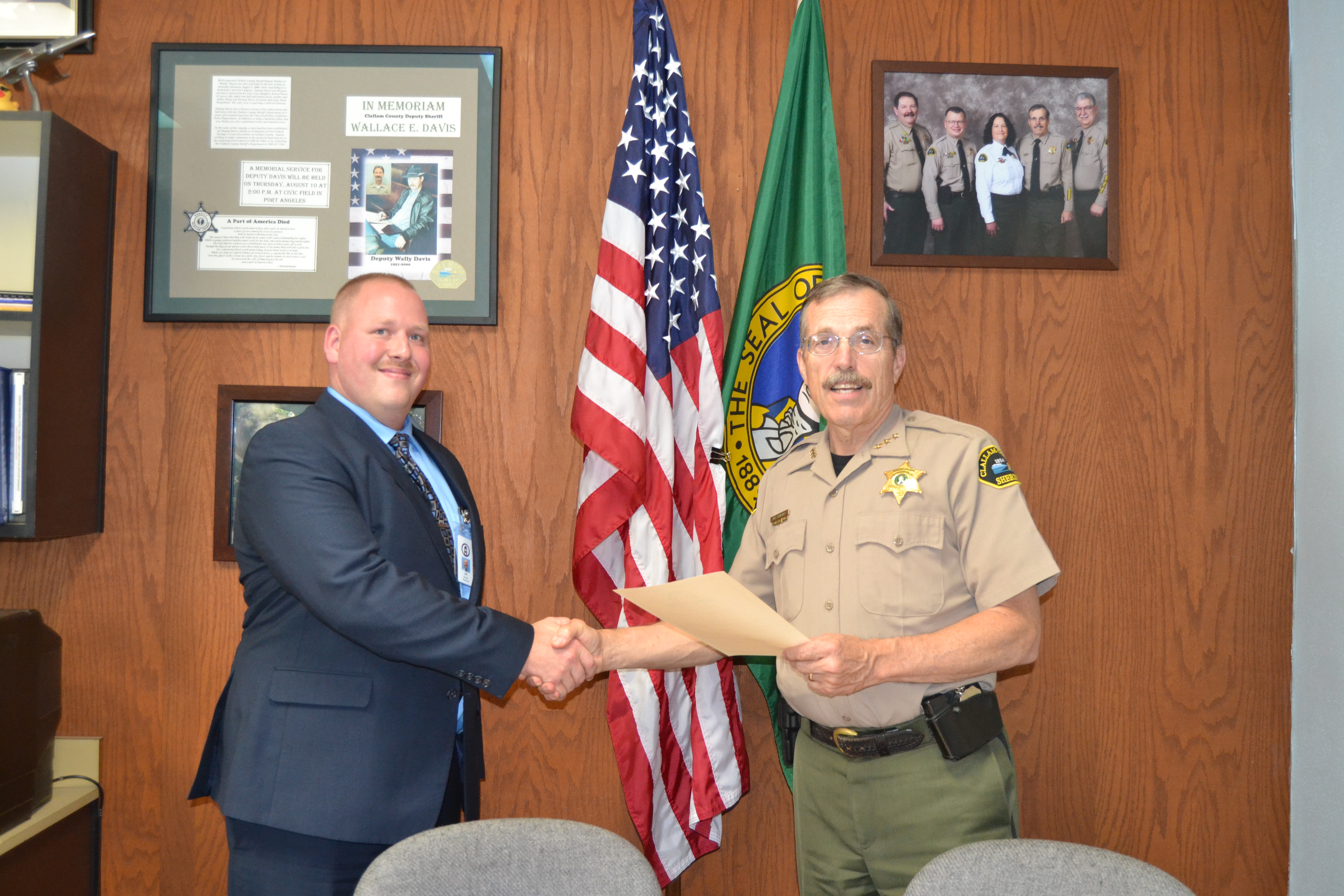 Clallam County Sheriff Bill Benedict swears in new patrol deputy James Gribbon. (Clallam County Sheriff's Office)