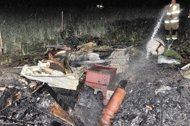 Firefighters responded to a beach on Mystery Bay for a fire that destroyed a home-built sauna. (East Jefferson Fire-Rescue)