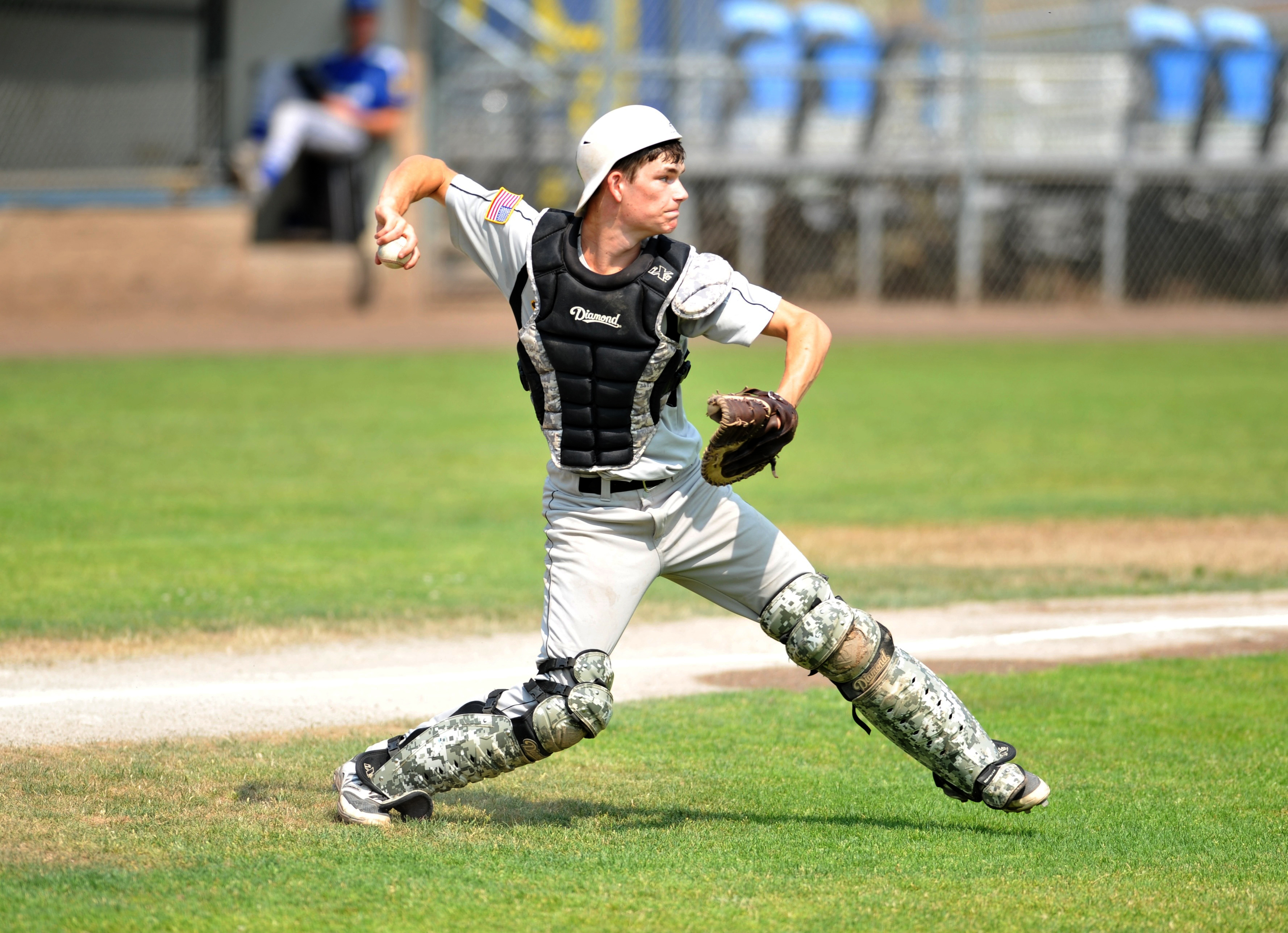 Olympic Crosscutters catcher Eli Harrison throws to second base. Harrison's throw was not in time. Jeff Halstead/for Peninsula Daily News