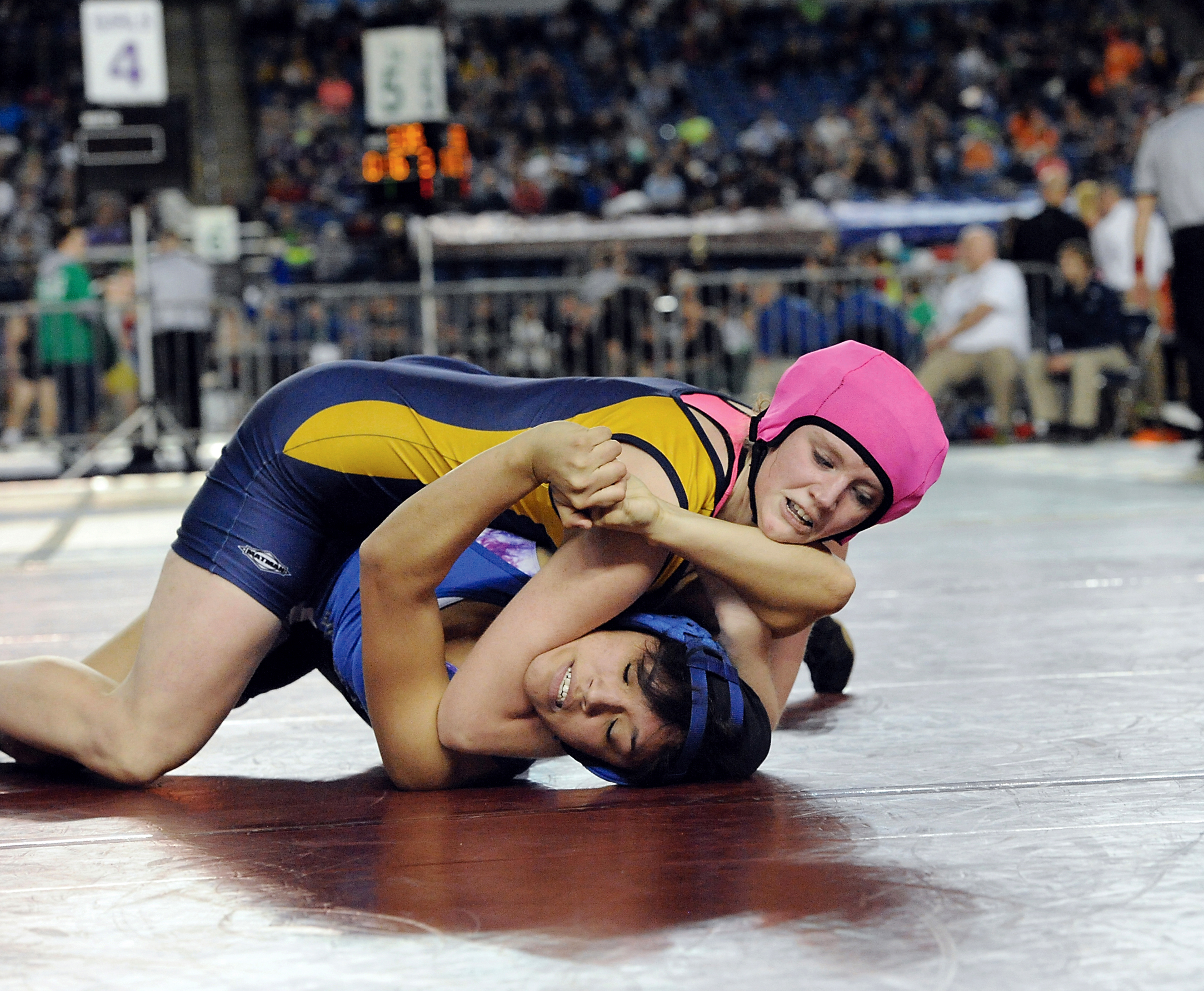 Forks' Brooke Peterson pins Elsa Gonzales of Kona Benton in the 145-pound girls wrestling semifinals at Mat Classic XXVII