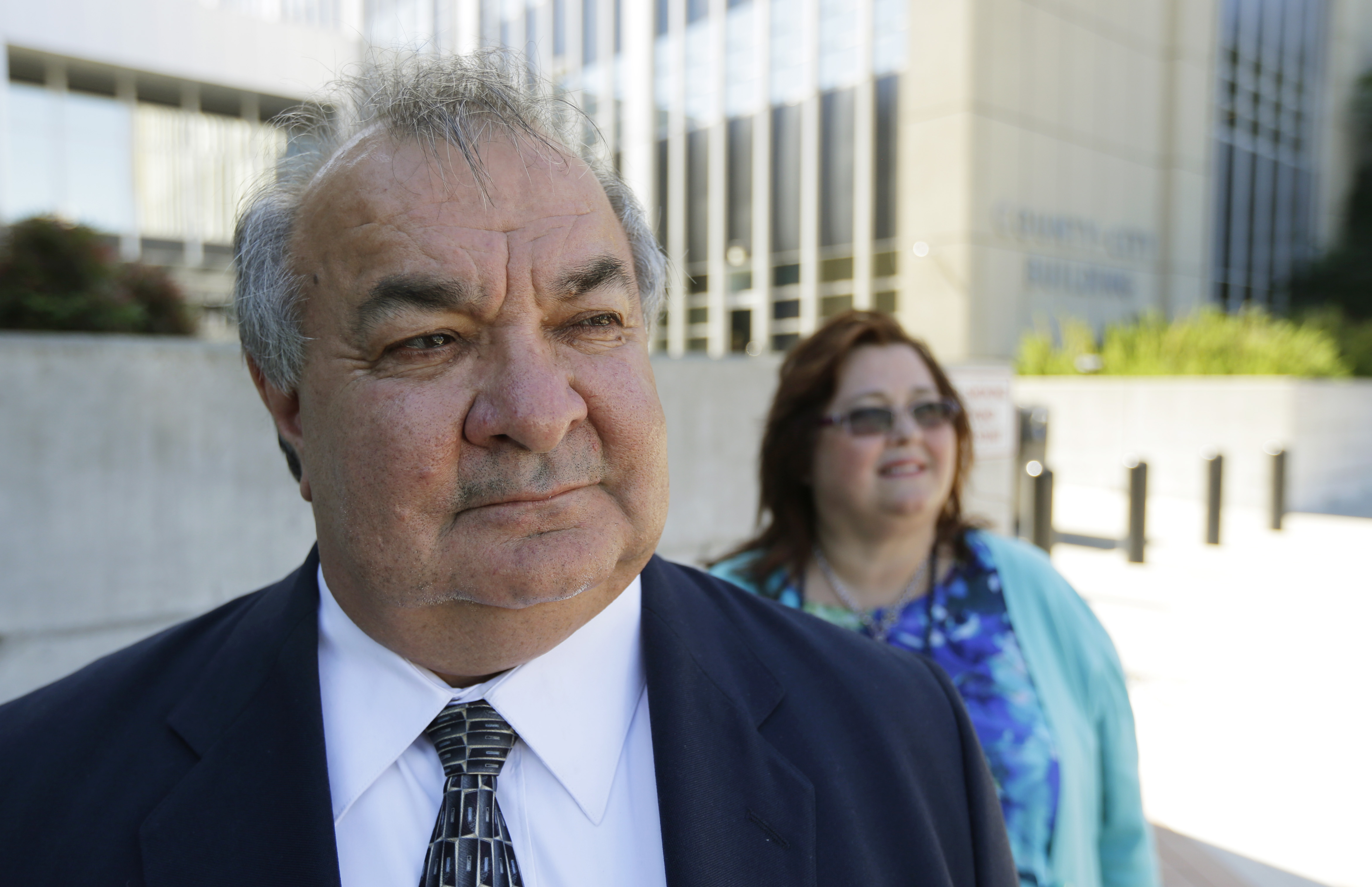 Steve Marrival poses for a photo with his wife