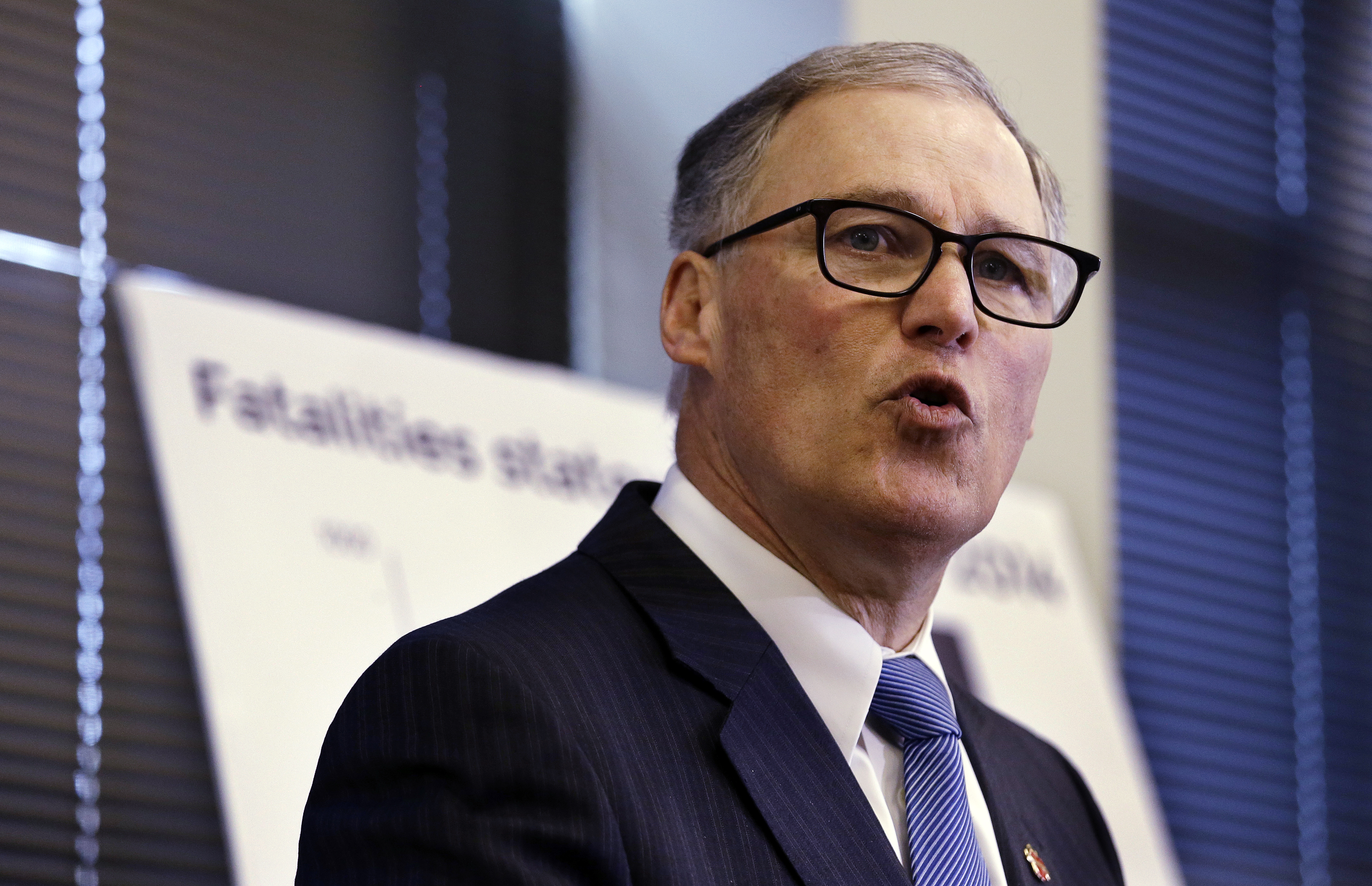 Gov. Jay Inslee speaks at a news conference announcing a statewide public health initiative to reduce and prevent firearm-related injuries and deaths. — The Associated Press ()