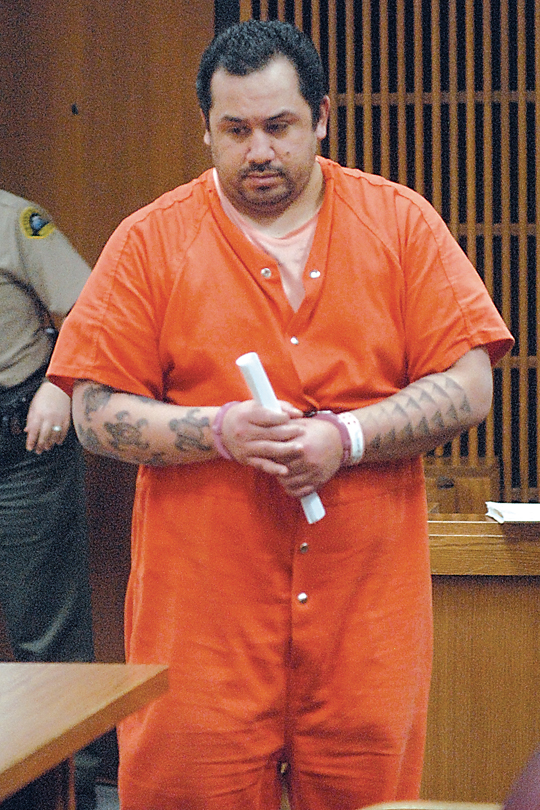Marshall Jay Lewis enters Clallam County Superior Court on Wednesday for a variety of charges related to the alleged New Year’s Day arson fire of the Beaver-area home of a woman who cut off a dating relationship with him. — Keith Thorpe/Peninsula Daily News ()