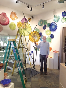 Designer Bob Rigg of Seattle Glassblowing Studio works on the Bobbi Burkett memorial sculpture. (City of Sequim)