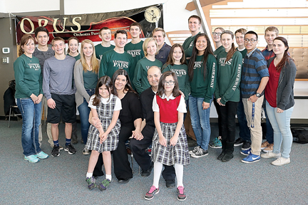 The family of Jaime Campos poses with Port Angeles High School Leadership students. From left in front row are Maracella