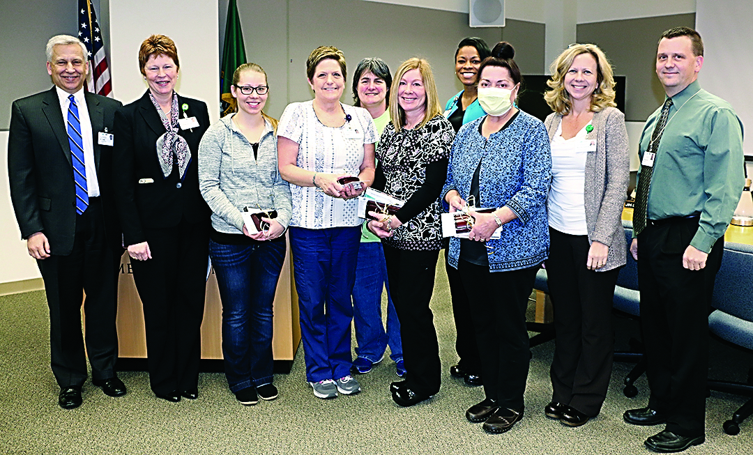The Olympic Medical Center’s board of commissioners recognized several employees during its Feb. 3 board meeting. Shown from left are Chief Executive Officer Eric Lewis; Chief Nursing Office Lorraine Wall