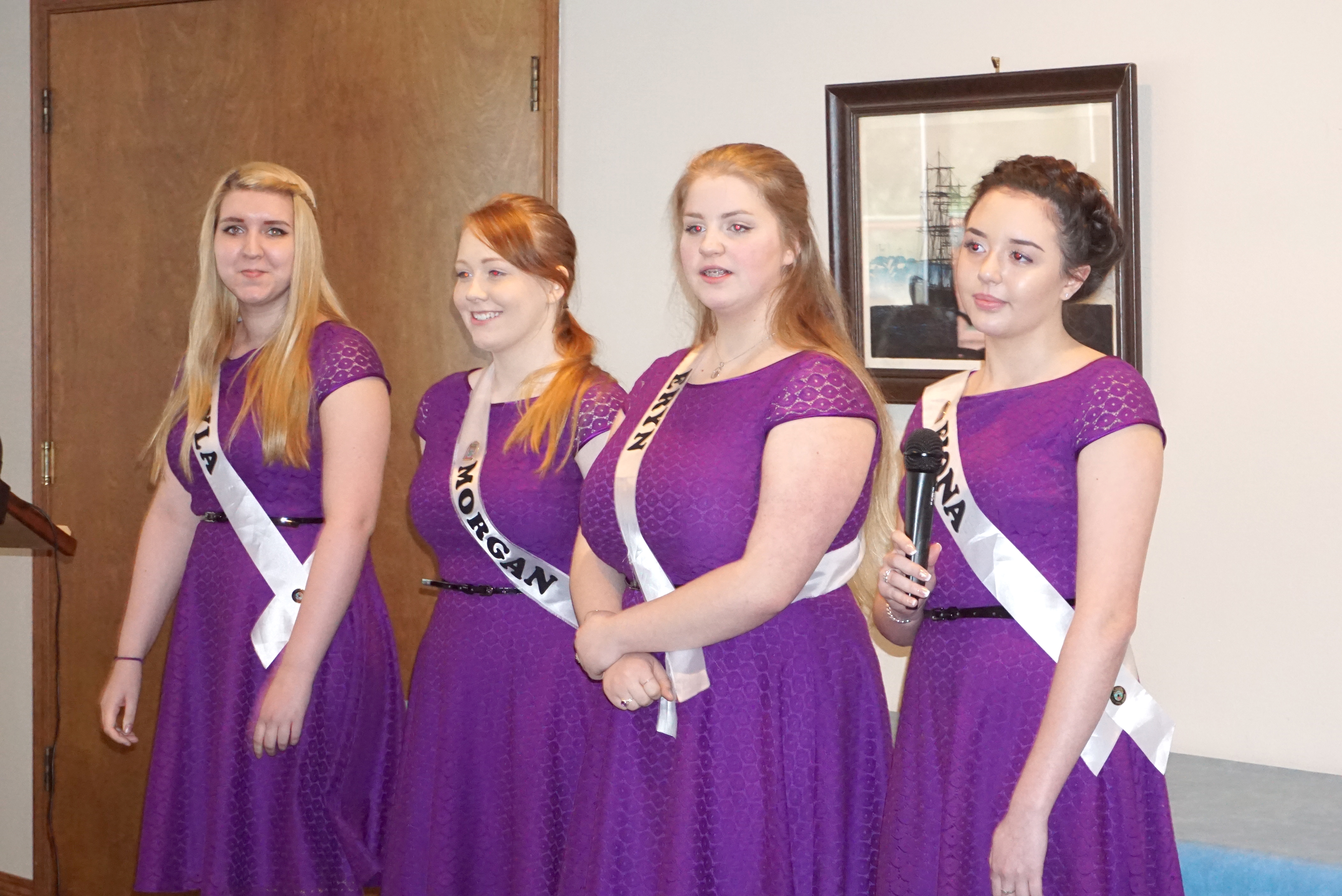 The four Rhododendron Festival royalty candidates spoke at the Jefferson County Chamber of Commerce on Monday. From left are Kayla Calhoun
