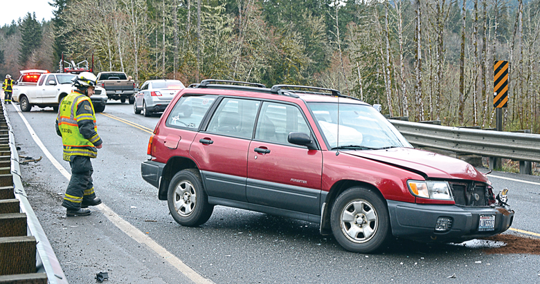 An 81-year-old man was treated and discharged after a two-vehicle wreck at U.S. Highway 101 and Olympic Hot Springs Road on Tuesday. — Jay Cline/Clallam County Fire District No. 2 ()