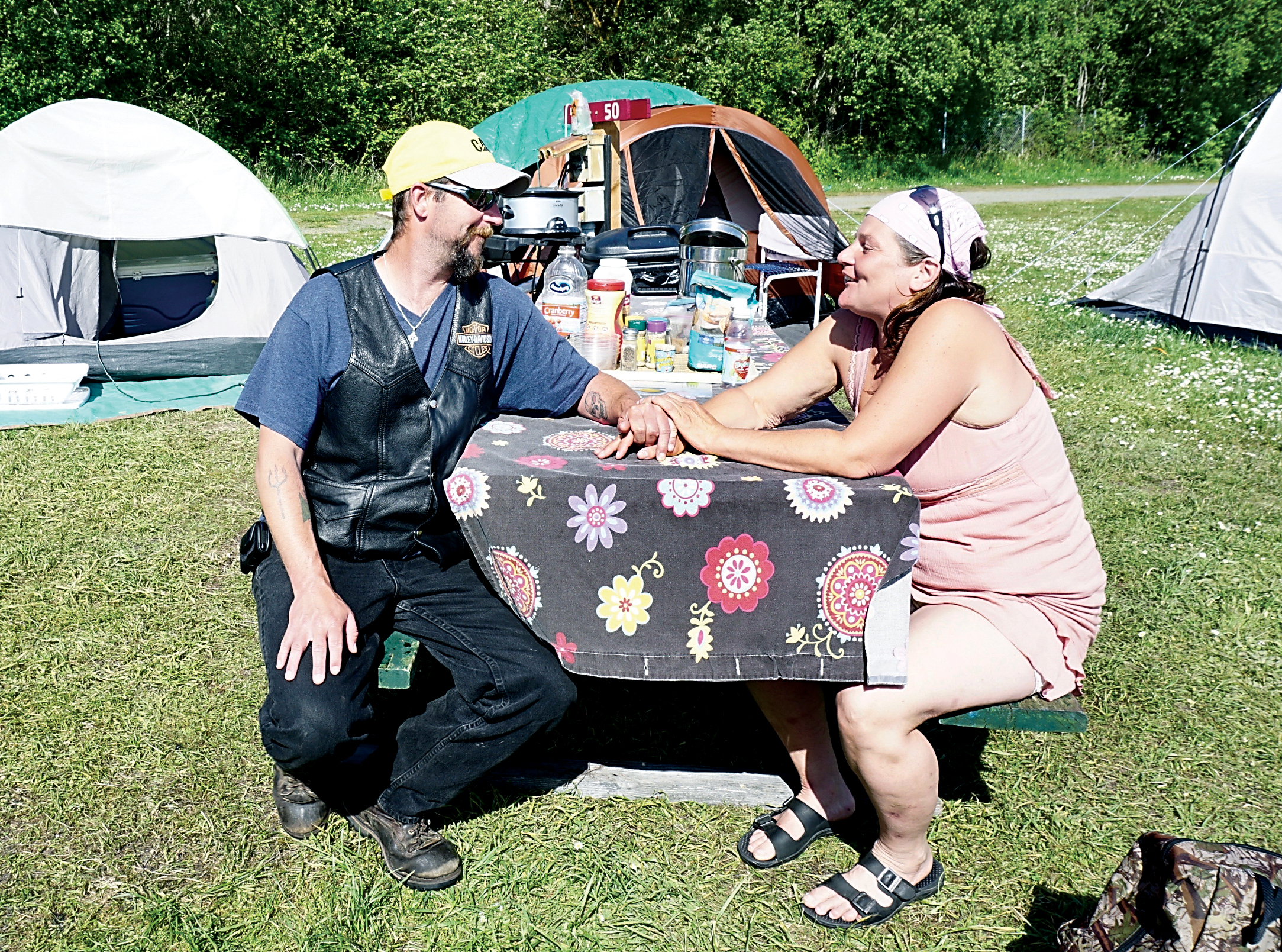 Bob Bates and Sonny Wargo are two of the 10 residents currently staying at the Affordable Housing Action Group campsites at the Jefferson County Fairgrounds in Port Townsend. — Charlie Bermant/Peninsula Daily News ()
