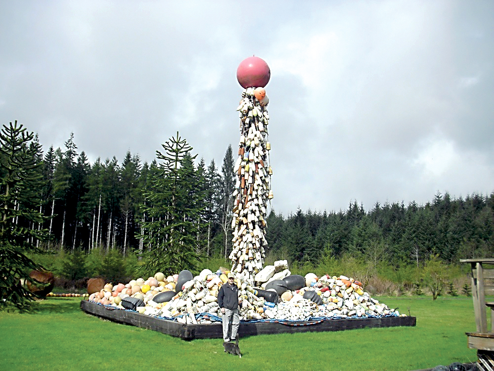 John Anderson and his trash/treasure monument. —Photo by Christi Baron/Forks Forum ()