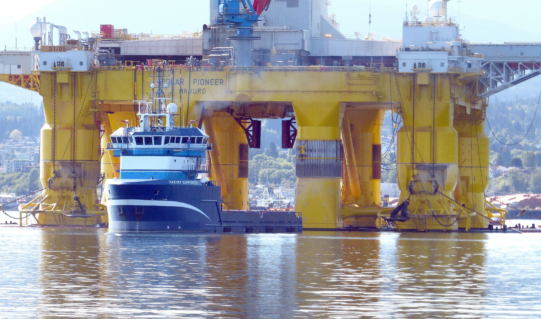 The blue offshore-supply vessel Harvey Supporter services the Polar Pioneer in Port Angeles Harbor. [Click on arrow upper right to see other vessels discussed in this column.] (David G. Sellars/for Peninsula Daily News)