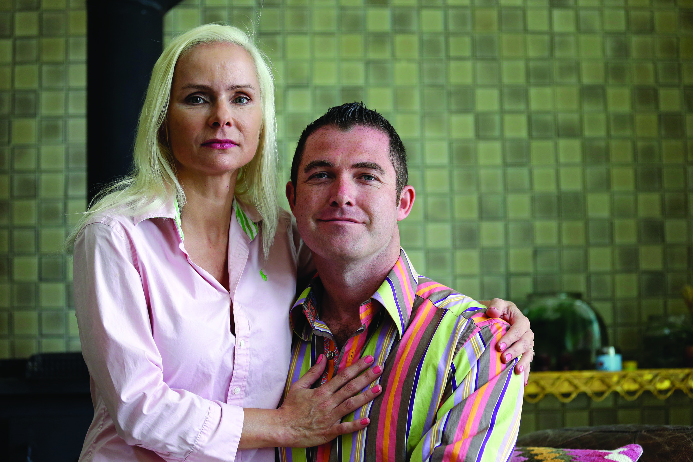Rolland Gregg and his fiance Sarah England pose for a photo at their home in Kirkland. Gregg and his family have fought federal marijuana charges for more than three years