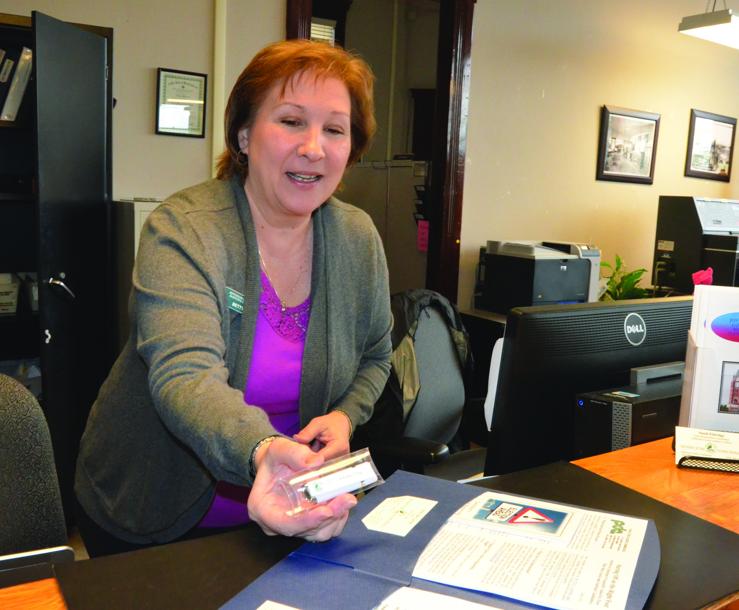 Jefferson County Elections Supervisor Betty Johnson with the new candidate filing packet: a USB drive. — Charlie Bermant/Peninsula Daily News ()