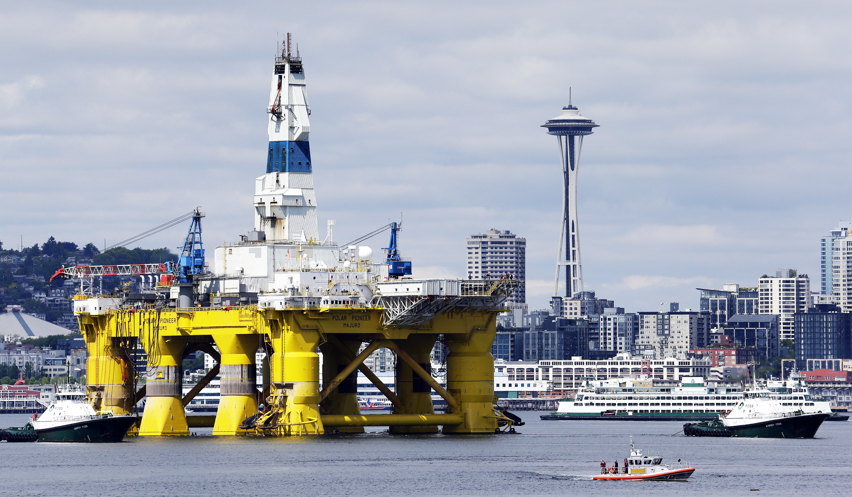 Two towers in Seattle: The Space Needle and the 355-foot-tall Polar Pioneer