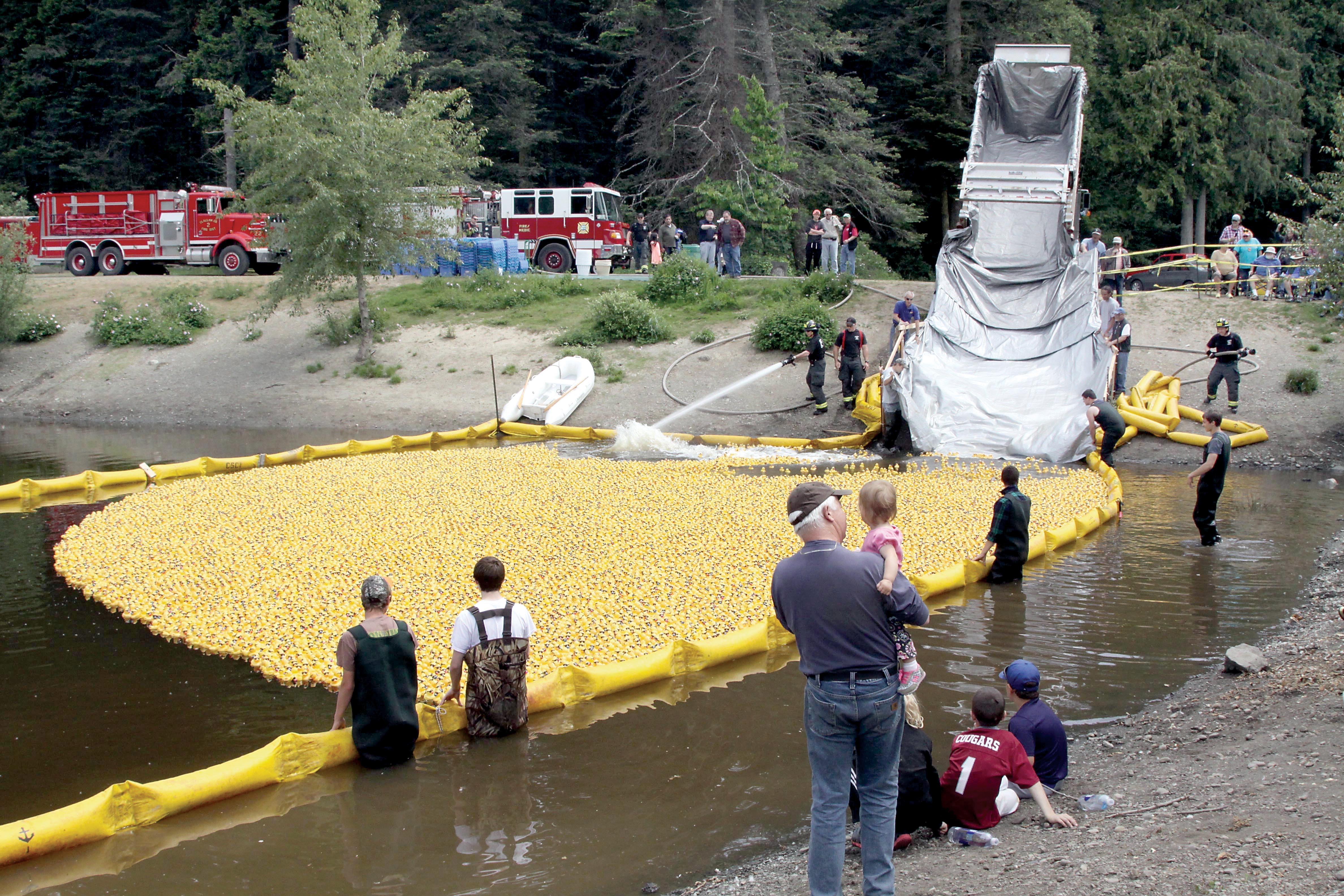 Onlookers watch as about 26