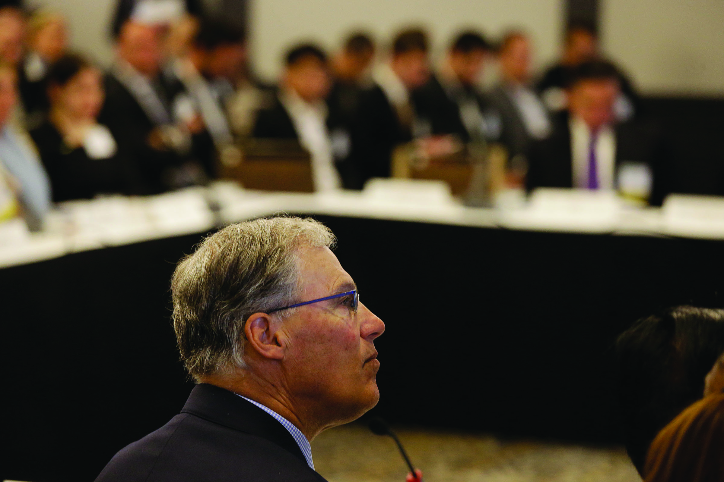 Washington Gov. Jay Inslee listens to California Gov. Jerry Brown deliver his keynote address during the Subnational Clean Energy Ministerial on Wednesday in San Francisco. — The Associated Press ()