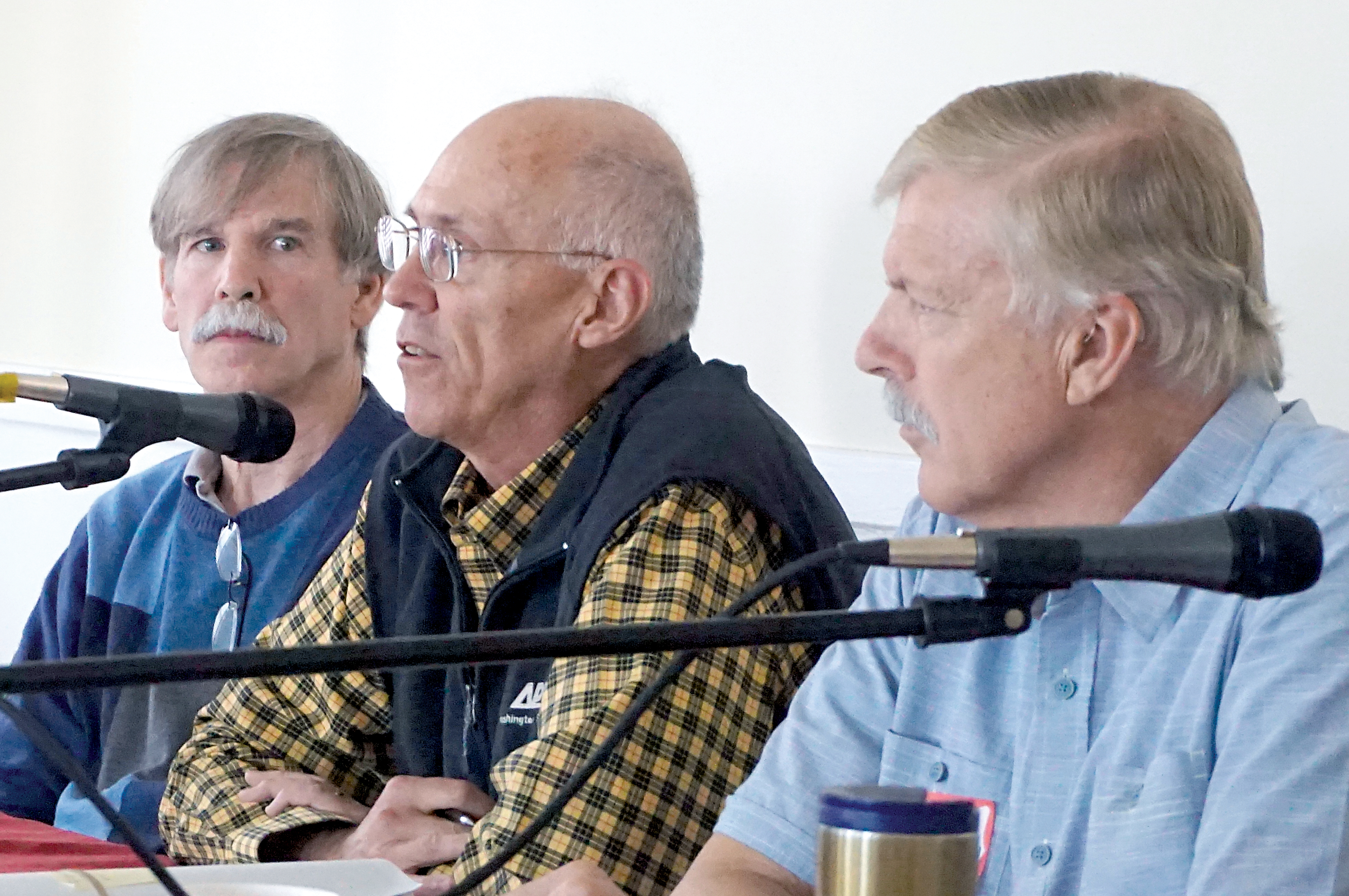 About 60 people attended a climate change conference Friday in Port Townsend and heard from officials including