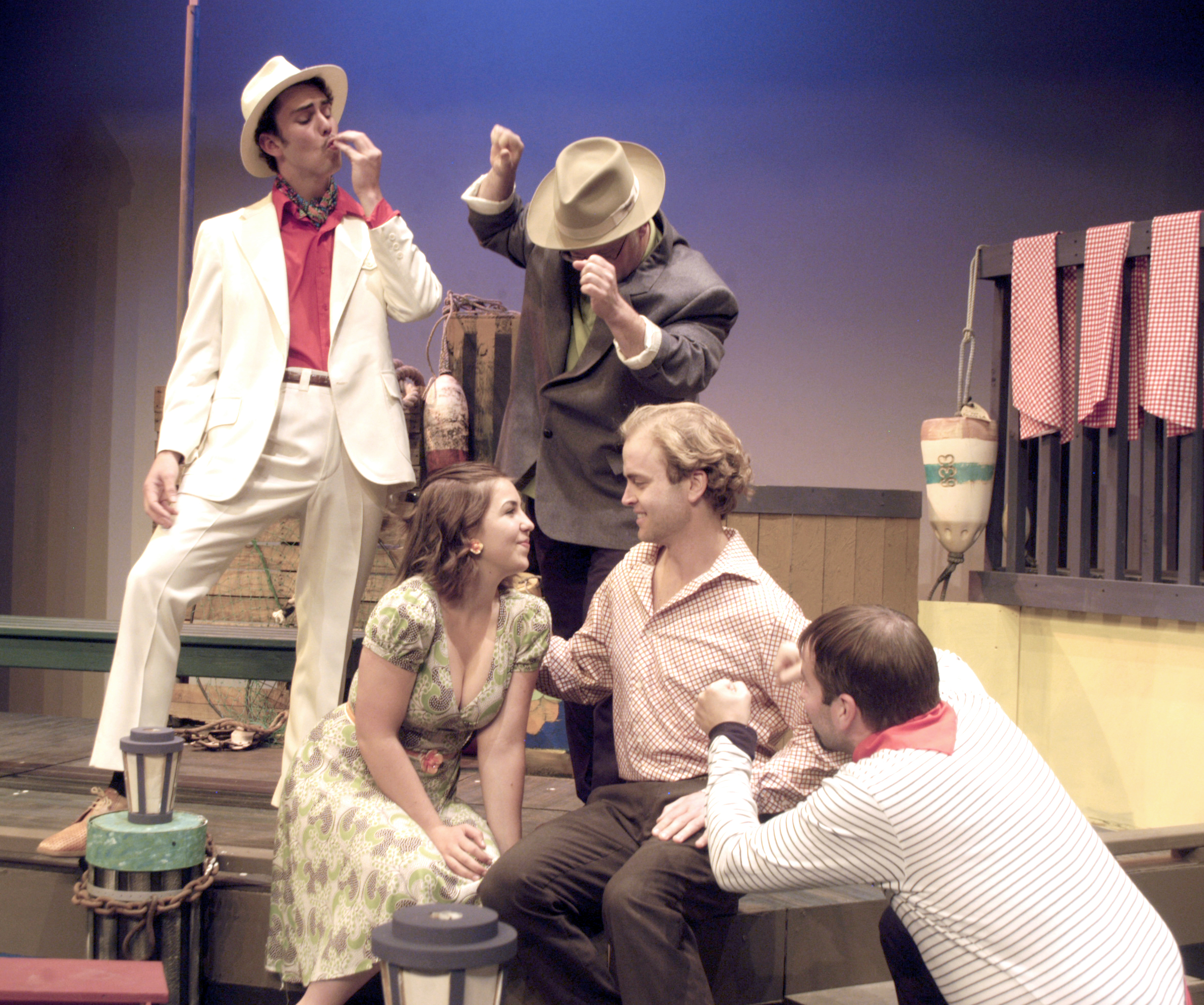 The cast of “Scapino!” rehearses a scene from the play