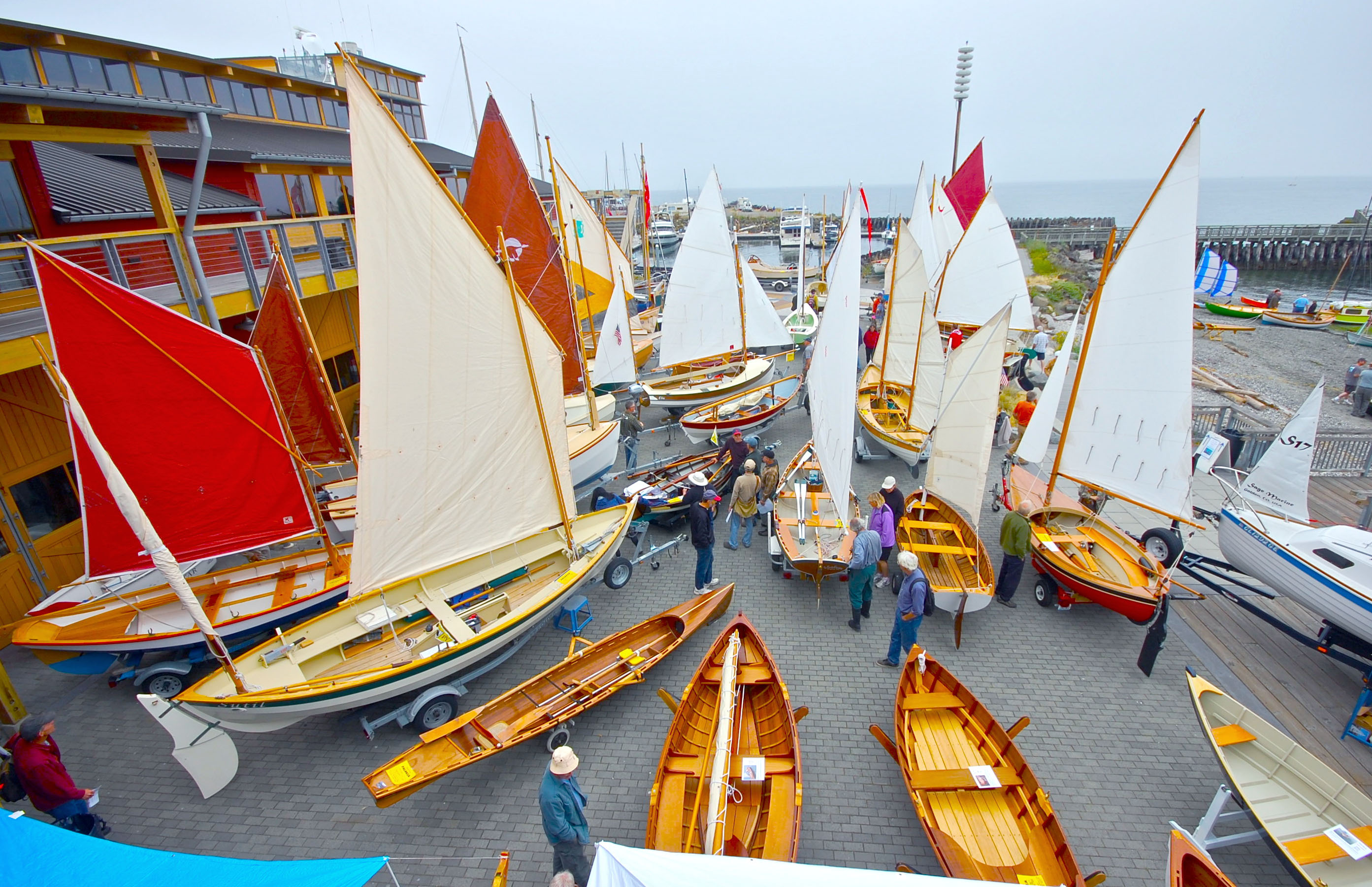 Visitors inspect the myriad small boats on display at the Pocket Yacht Palooza in Port Townsend in 2014.