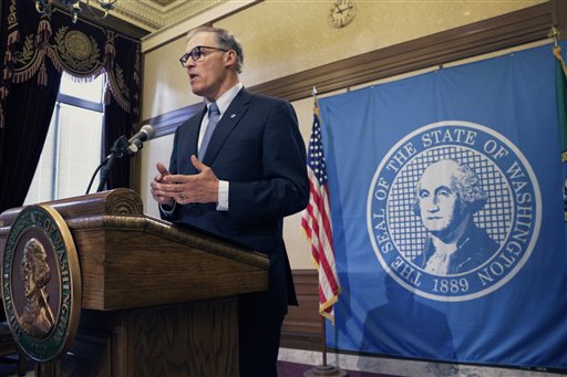 Gov. Jay Inslee announces that he’s taking action to cap carbon emissions
