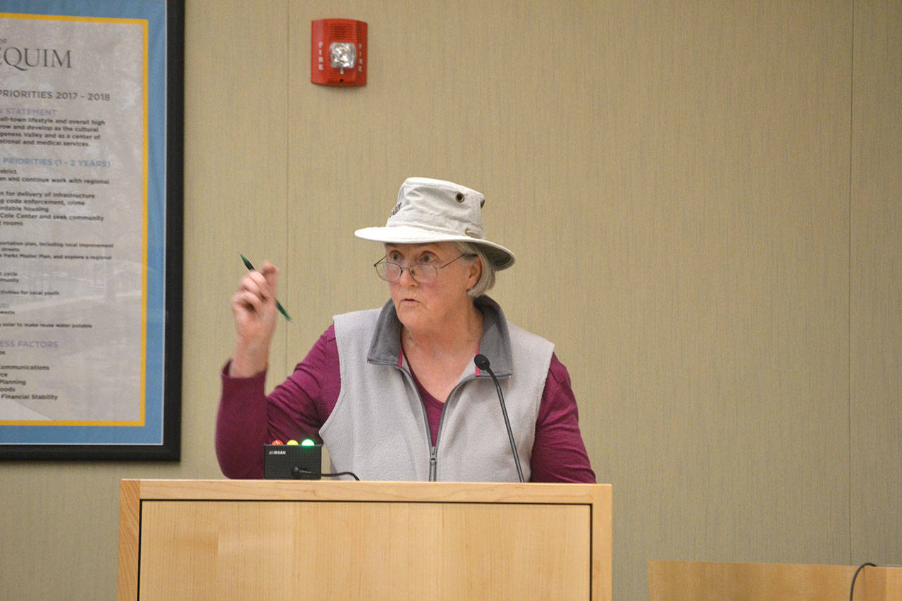 Matthew Nash/Olympic Peninsula News Group                                Sequim resident Ann Moore talks to Sequim council members Oct. 23 about the possibility of banning pit bulls in Sequim city limits.