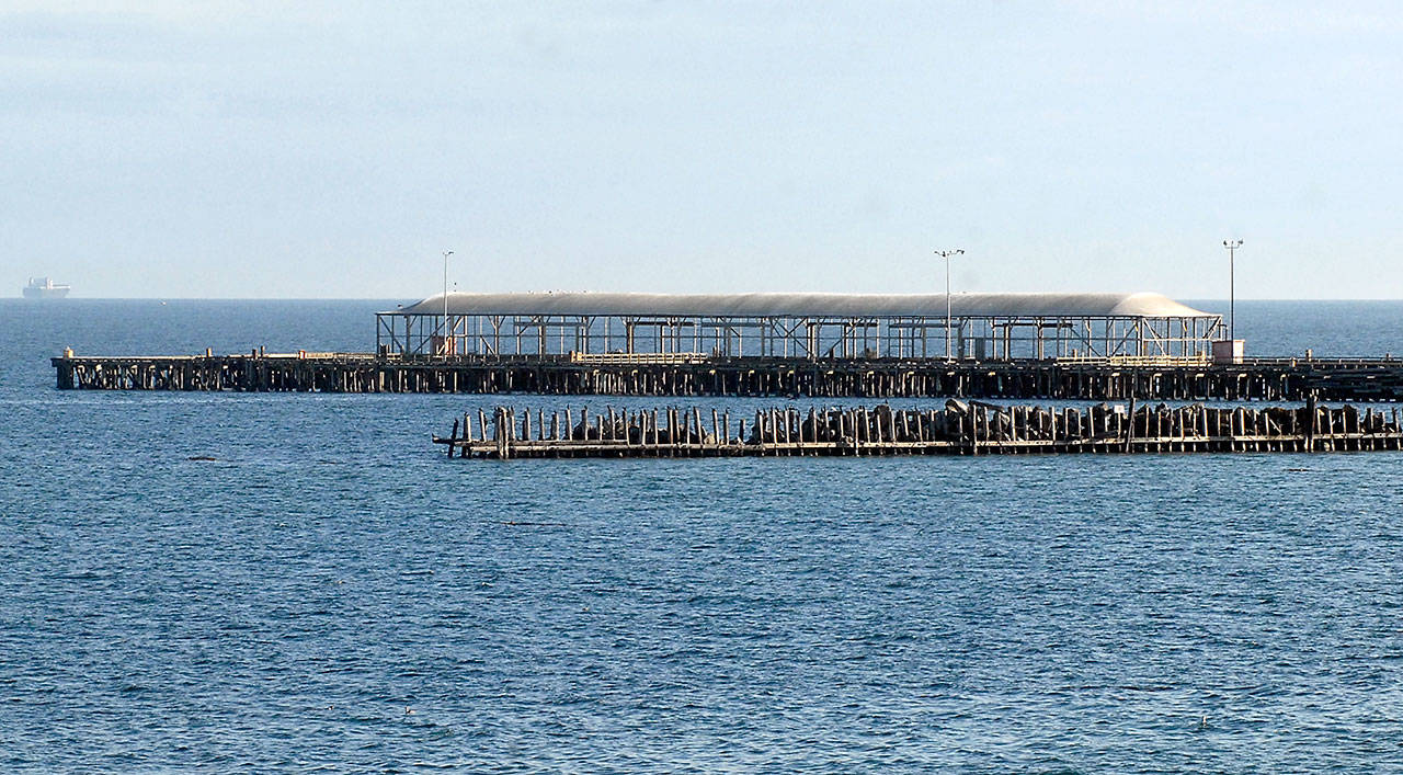 A loading dock and jetty, seen Wednesday, are among the few structures that remain intact at the former Rayonier mill site in Port Angeles. (Keith Thorpe/Peninsula Daily News)