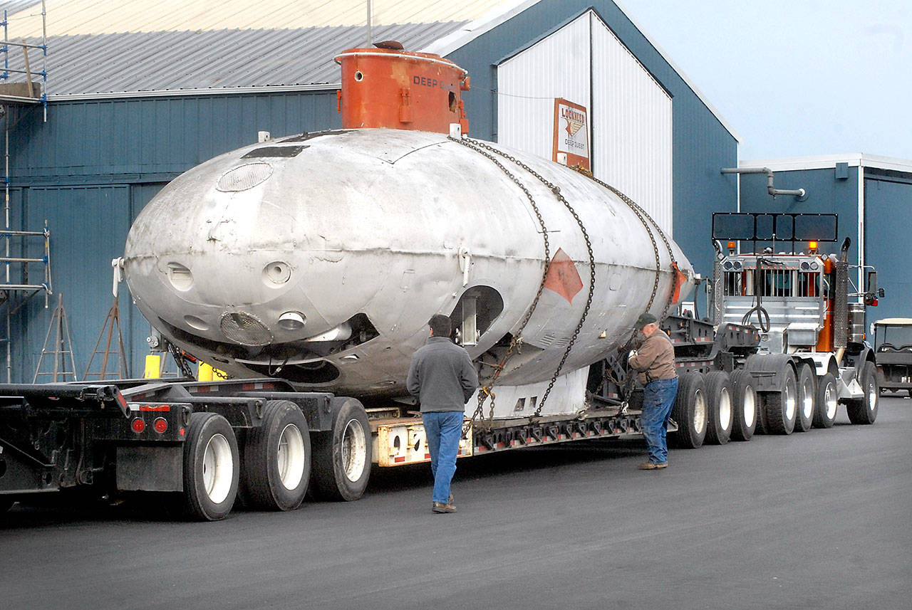 The submersible Deep Quest is prepared for unloading at Platypus Marine Inc. in Port Angeles after its arrival from the U.S. Naval Undersea Museum in Keyport on Tuesday. The Deep Quest, which had been on display at the museum, was built and operated by the Lockheed Missiles and Space Co. in the mid-1960s as a prototype deep-submergence rescue vehicle and was operational until 1980. (Keith Thorpe/Peninsula Daily News)