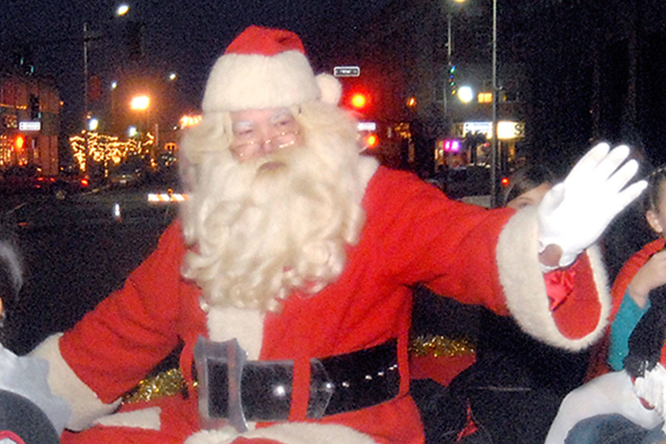 Photo: Santa arrives by canoe in Port Angeles