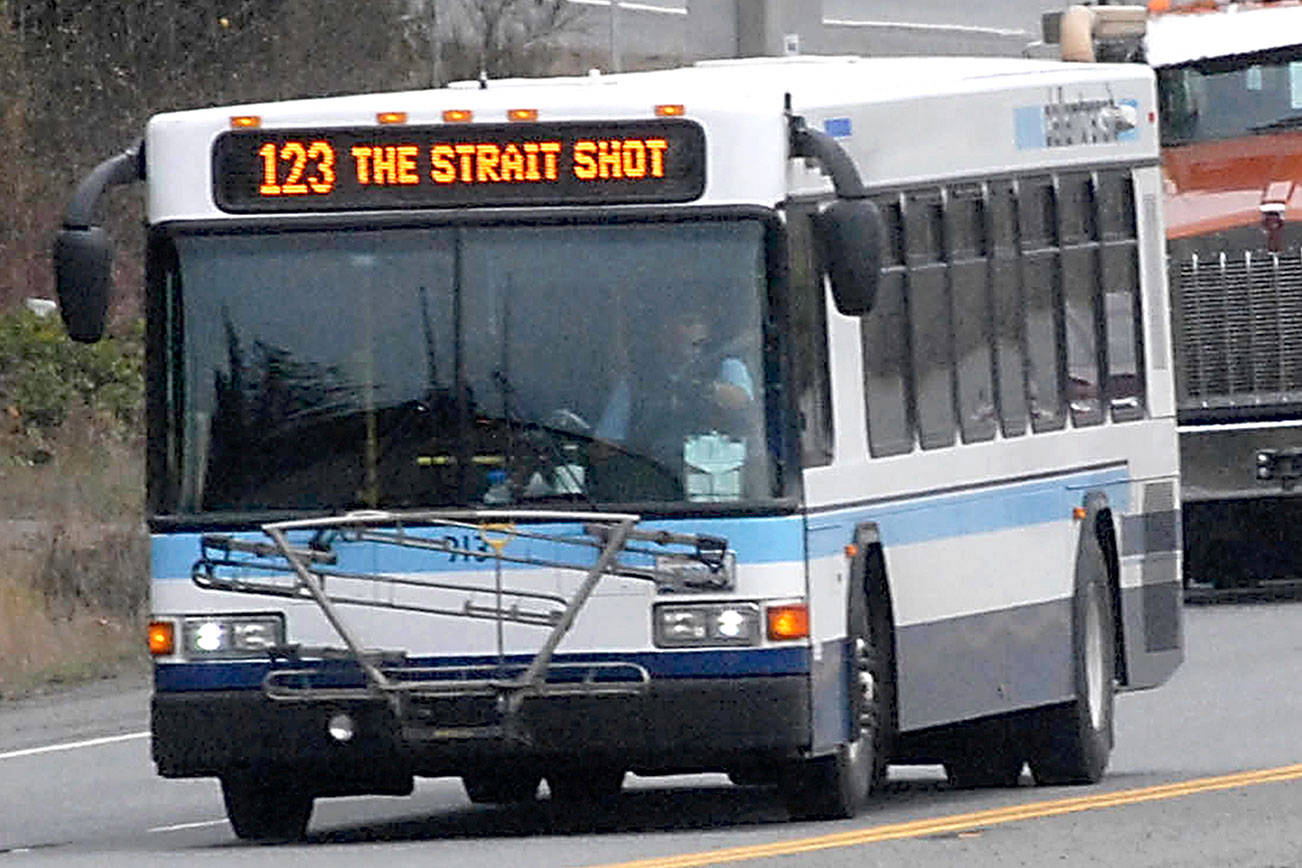 Keith Thorpe/Peninsula Daily News                                Clallam Transit’s Strait Shot bus approaches Port Angeles on U.S. Highway 101 on a recent run from the Bainbridge Island ferry terminal.