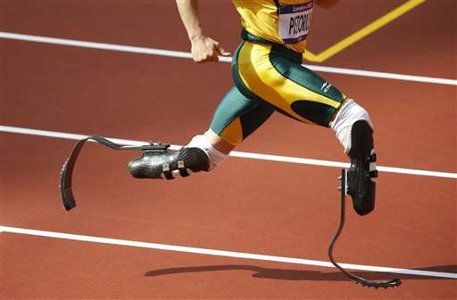 South Africa's Oscar Pistorius competes in a men's 400-meter heat  in the Olympic Stadium on Saturday.  (1 of 5 photos) The Associated Press