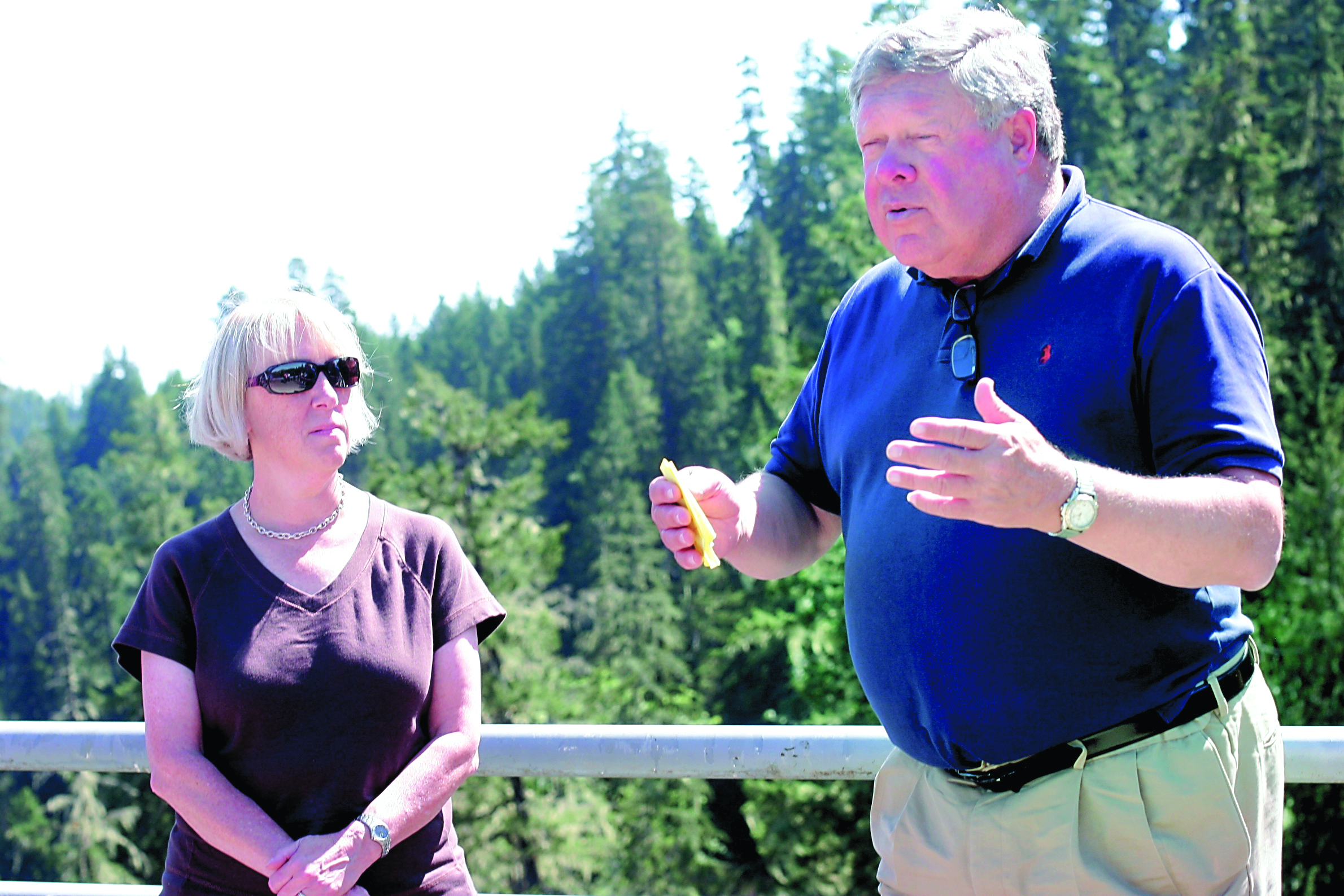 U.S. Sen. Patty Murray and U.S. Rep. Norm Dicks stand Thursday on the High Steel Bridge above the South Fork of the Skokomish River