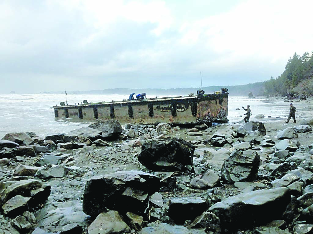 Dock is precariously positioned on the rocky beach. Washington Dept. of Fish & Wildlife