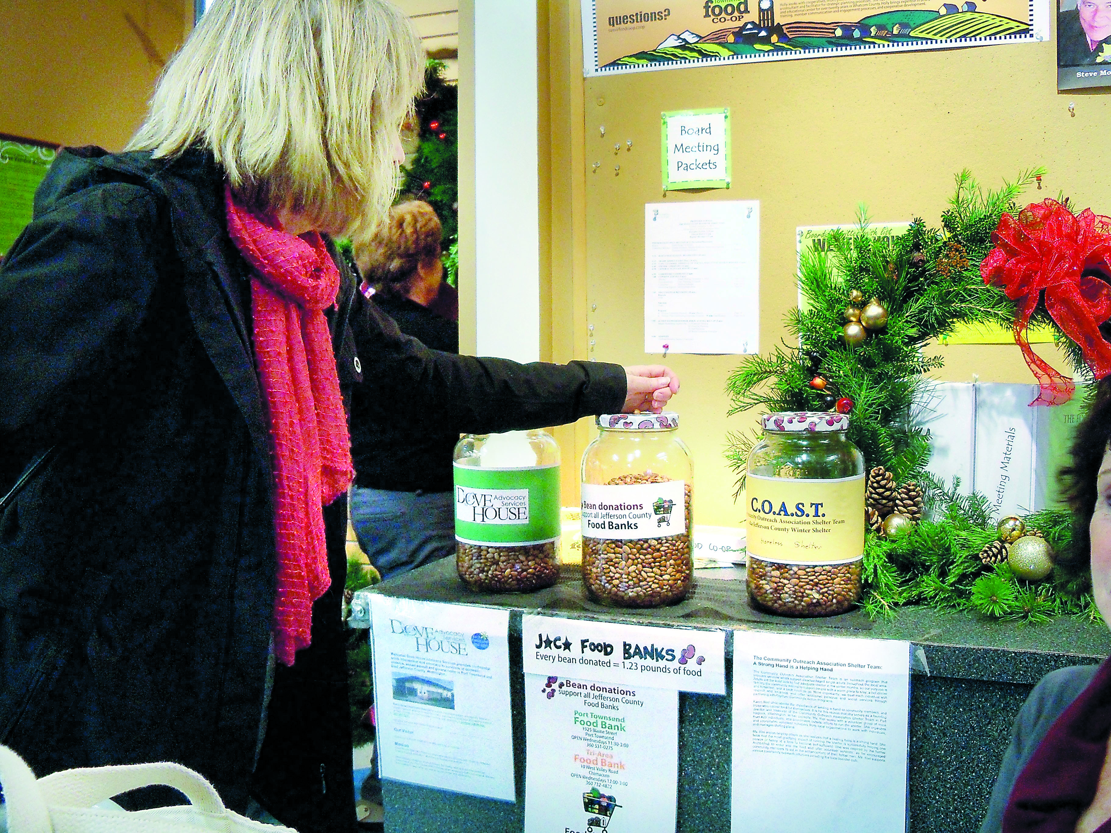 The Port Townsend Food Co-op's “Beans for Bags” program lets members who bring in reusable bags for their groceries choose from a 5-cent refund or a bean worth 5 cents that they can drop in their choice of glass gallon jars designated for three local nonprofit organizations.