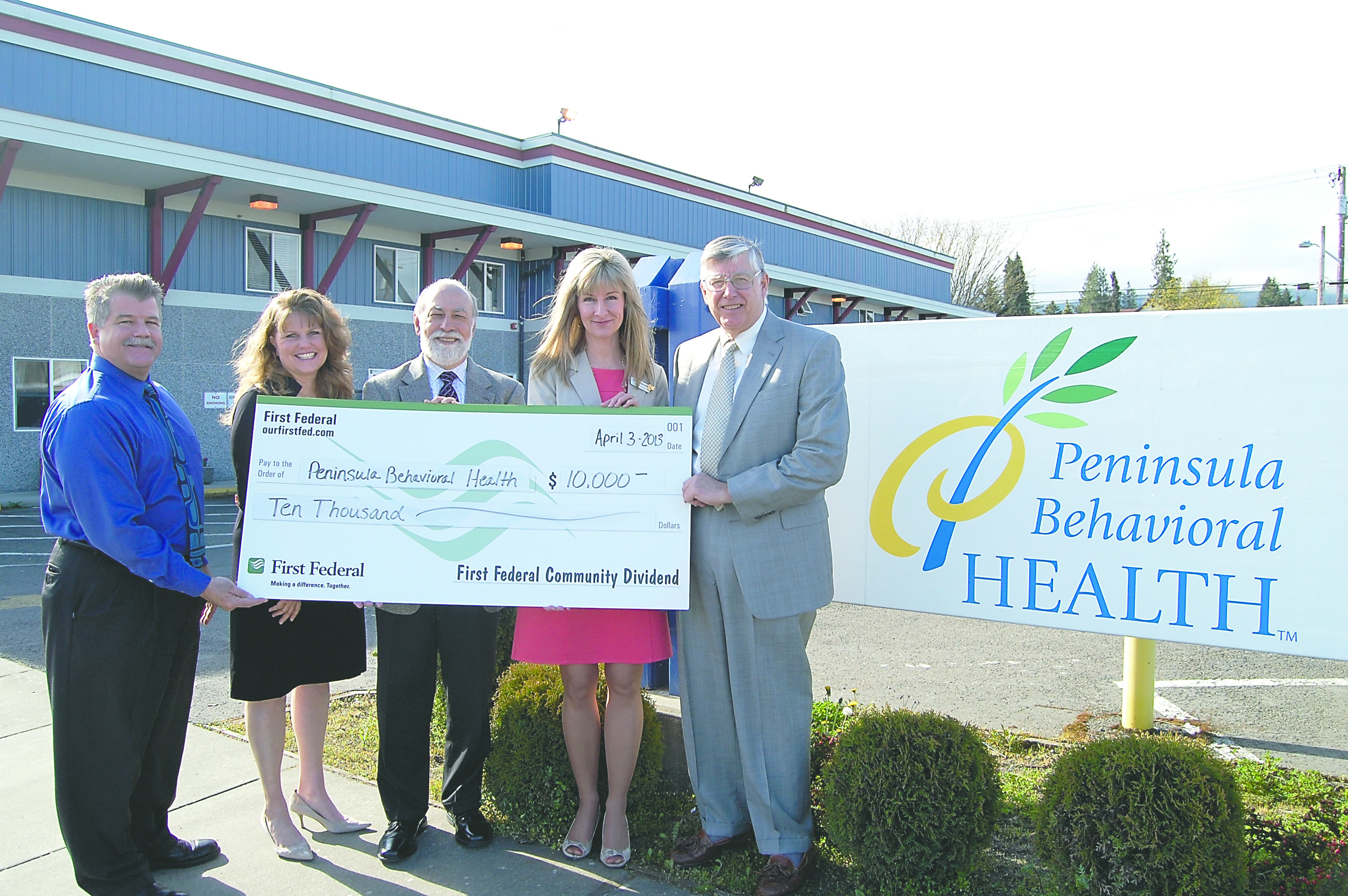From left are First Federal President/CEO Larry Hueth
