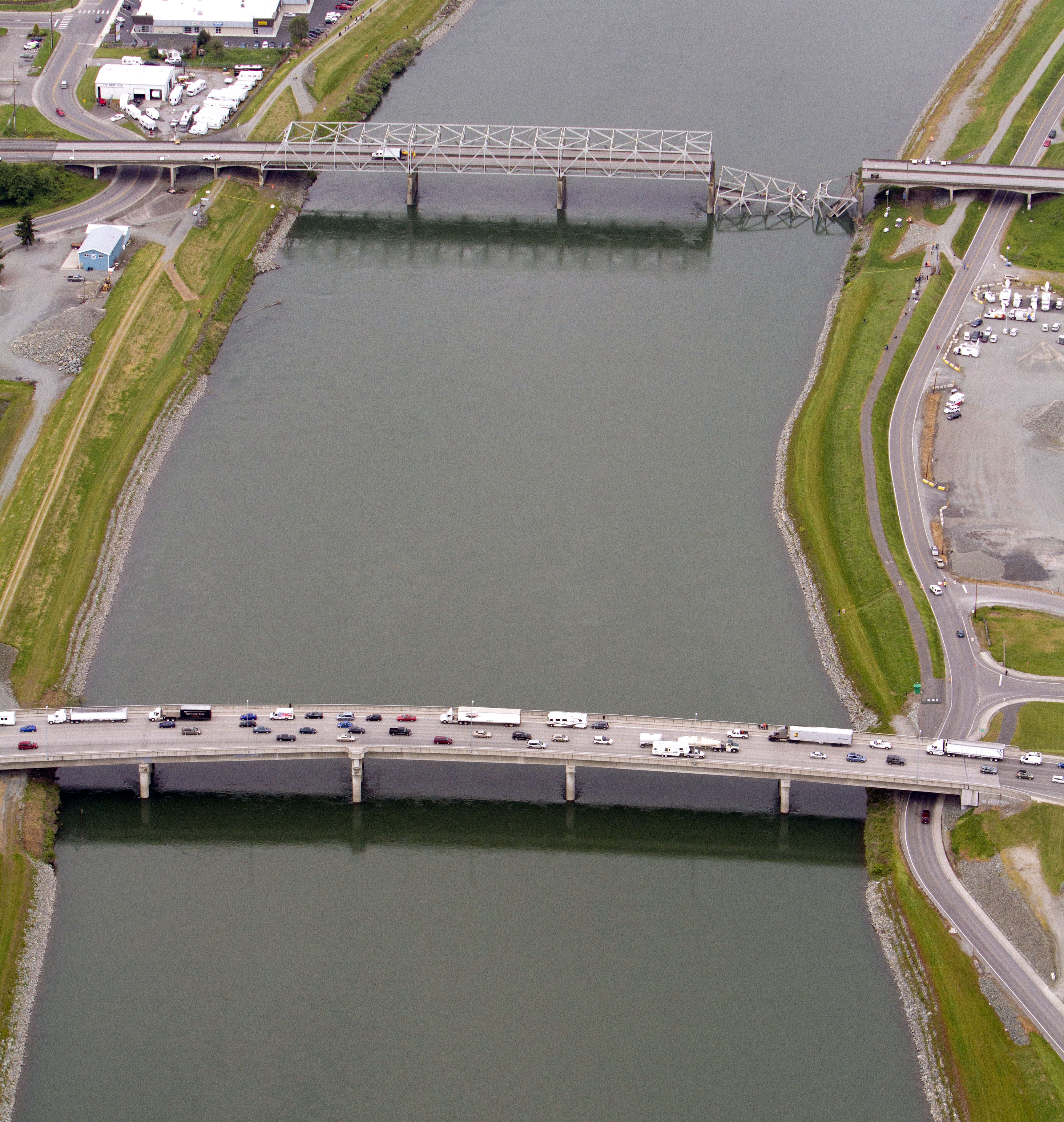 Motorists use another bridge to detour across the Skagit River in Mount Vernon.