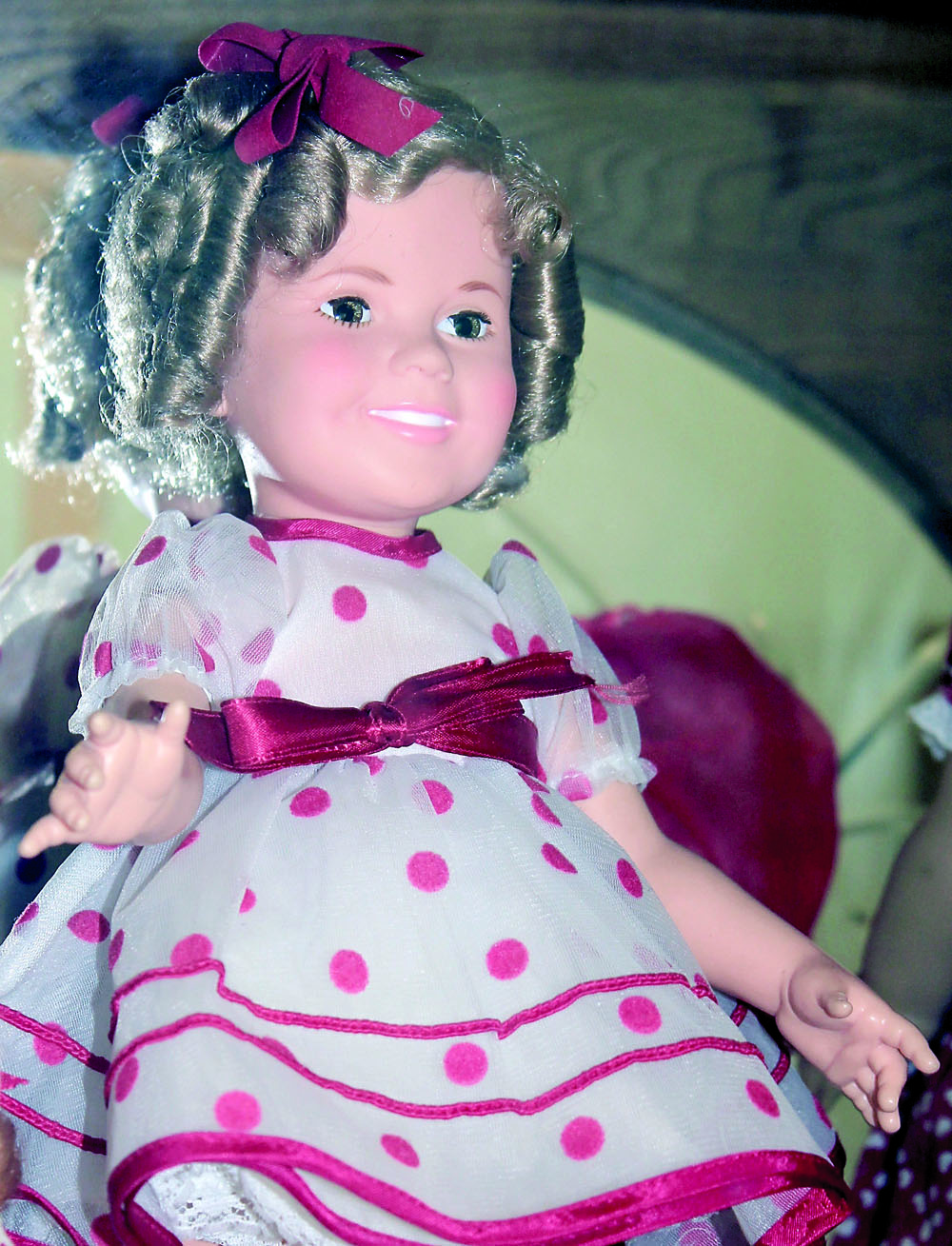 A 1970s-vintage Shirley Temple doll is among the two dozen figures in the “Valentine Sweethearts” doll show at Sequim's Museum & Arts Center. Renee Mizar