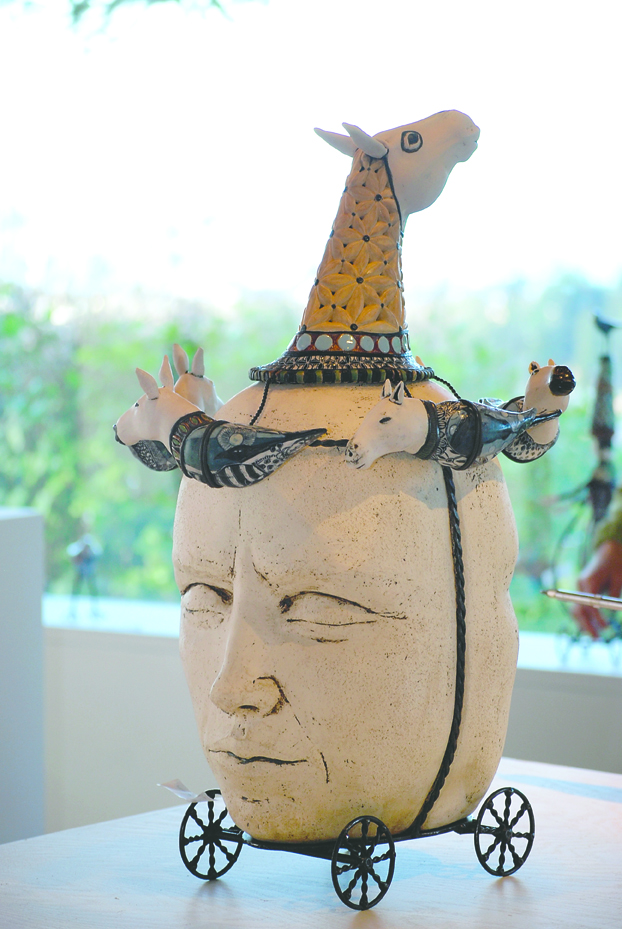 Mixed-media creations by John and Robin Gumaelius