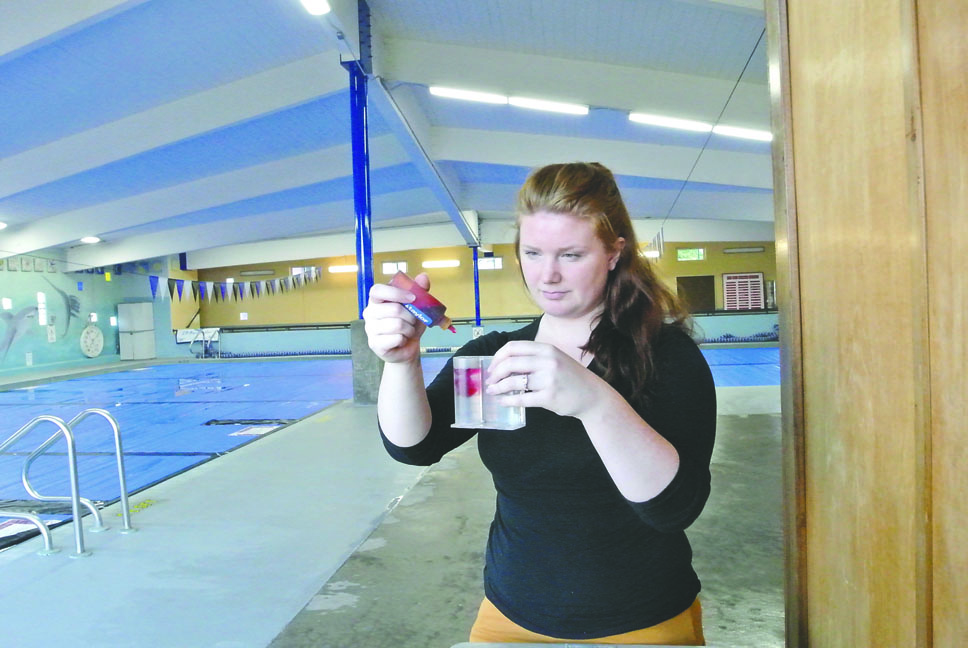 Port Townsend Pool Manager Anji Scalf tests the pH level at the pool
