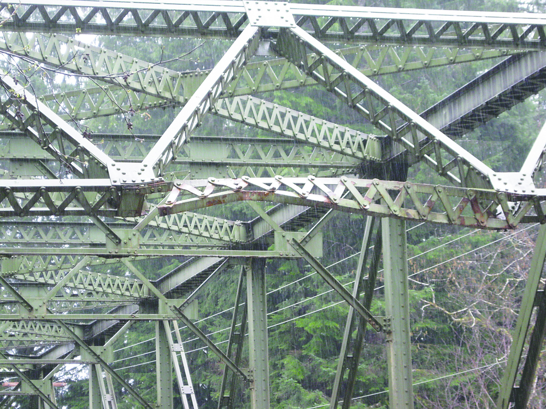 An overhead beam on the Sol Duc River bridge in Forks shows damage from being clipped recently
